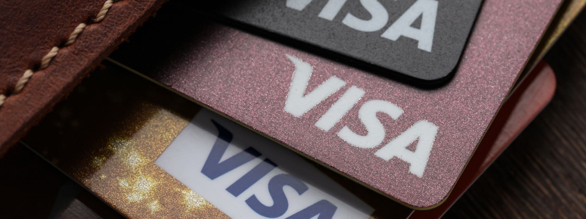 Banner image of four visa cards.